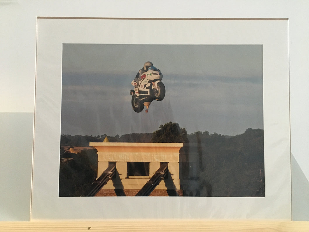 Motor-bike balloon jumps bridge - Photographic print - Keith Rodgerson